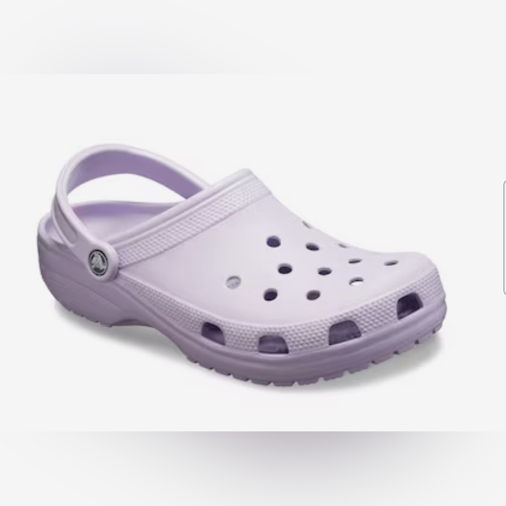 Women’s purple Crocs with removable sunflower jibbets